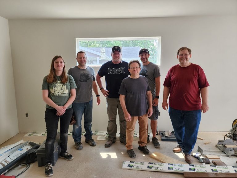 The engineering team volunteering together at a Habitat for Humanity build site. 2023